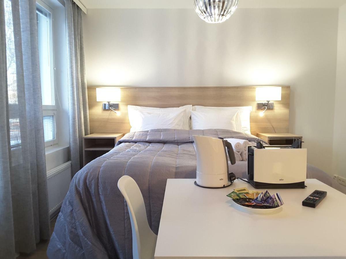 City Apartments With Balcony โรวานิเอมิ ภายนอก รูปภาพ